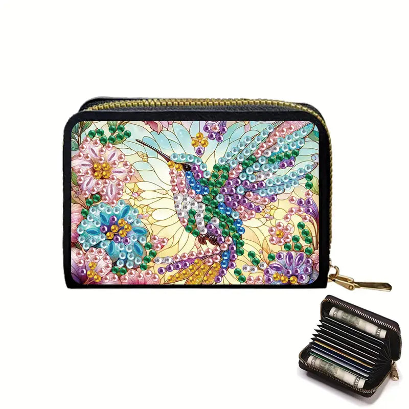 Decorative wallet with a colorful hummingbird design on a white background