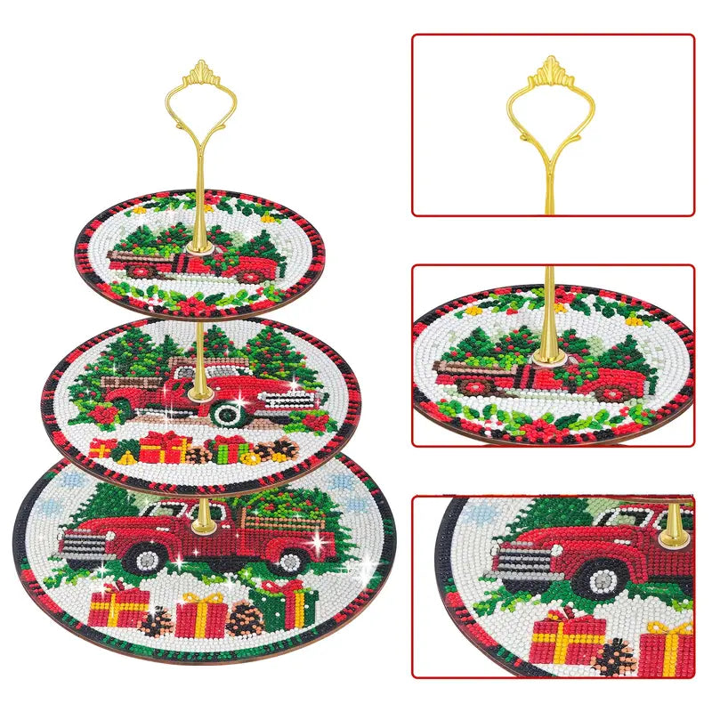 Three-tiered Christmas-themed plate set with red truck and festive decorations on a white background.
