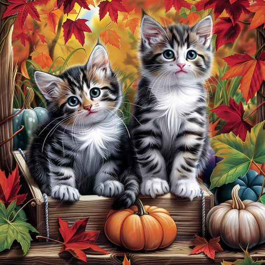 A colorful image of two kittens with stripes, sitting on a wooden surface surrounded by autumn leaves and pumpkins.