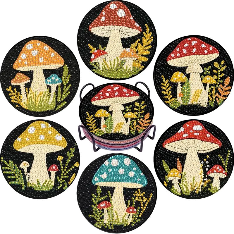 A set of six completed round diamond painting coasters, each featuring a different colorful mushroom, displayed in a black wire holding rack.