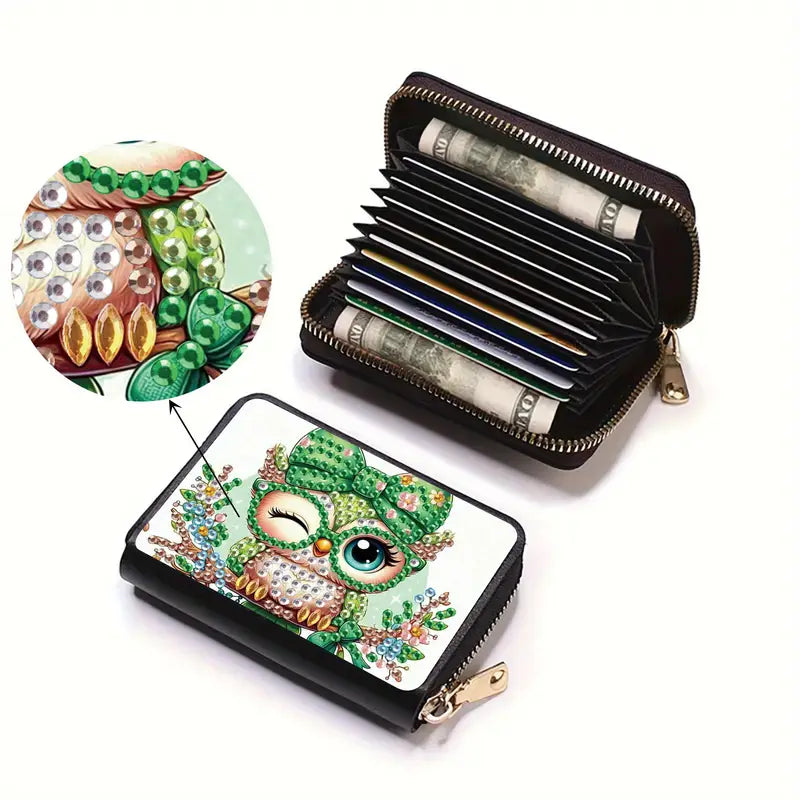 Decorative wallet with owl design and money insert on a white background