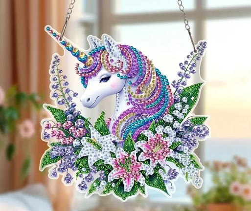 Magical Unicorn Floral Hanging Diamond Painting Kit. A single-sided acrylic hanging of a unicorn head with a rainbow mane, surrounded by flowers, to be decorated with crystal and special shape diamonds.
