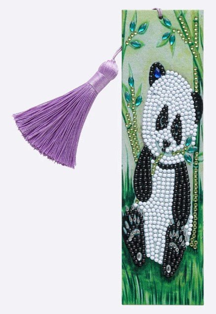 Diamond painting bookmark with a cute panda sitting in bamboo and a purple tassel.