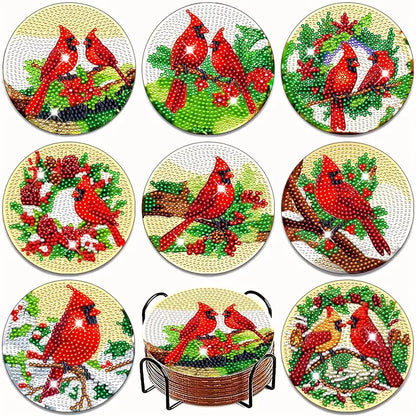 Set of diamond painting coasters with red cardinals and winter scenes.