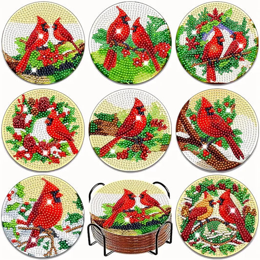 Set of diamond painting coasters with red cardinals and winter scenes.