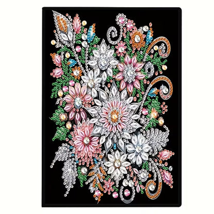 A rectangular black plaque or frame featuring a highly detailed, colorful floral and ornamental design with sparkling gem-like motifs in pink, white, green, blue, orange, and silver tones.
