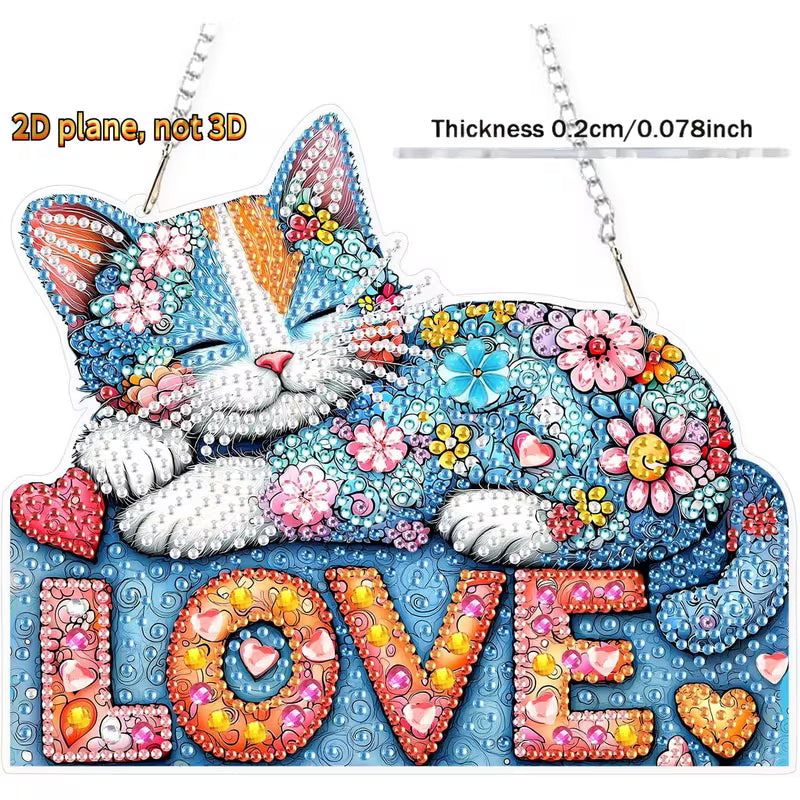 A colorful rhinestone-style decorative sign shaped like a sleeping cat resting on the word LOVE. The design features many bright floral and heart motifs, with text reading '2D plane, not 3D' and 'Thickness 0.