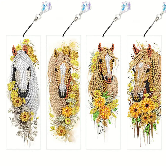 Set of four horse head designs with floral elements on a white background