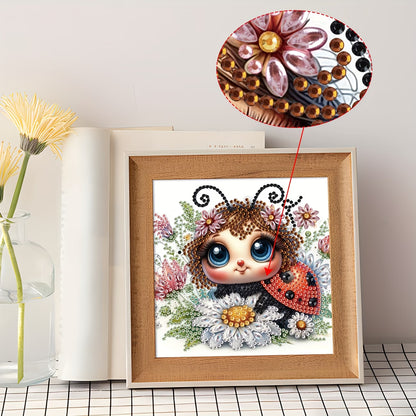 Framed artwork of a cartoon character with ladybug wings and flowers, close-up of beadwork shown.