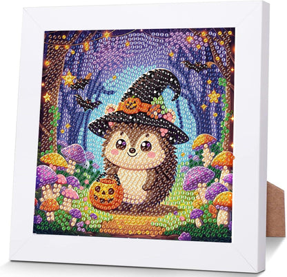 Decorative panel with a hedgehog wearing a witch hat and pumpkin, surrounded by mushrooms and flowers, framed in white.