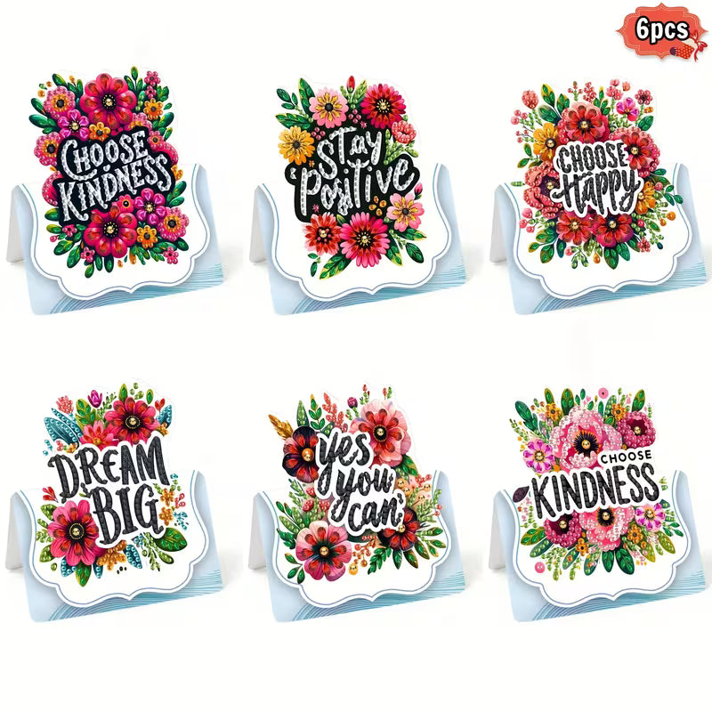 Set of six motivational stickers with floral designs and text on a white background
