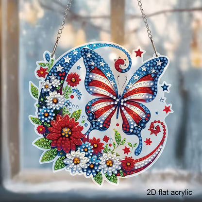 A round 2D flat acrylic diamond painting sun catcher featuring a butterfly with star and stripe wings surrounded by red and white flowers.