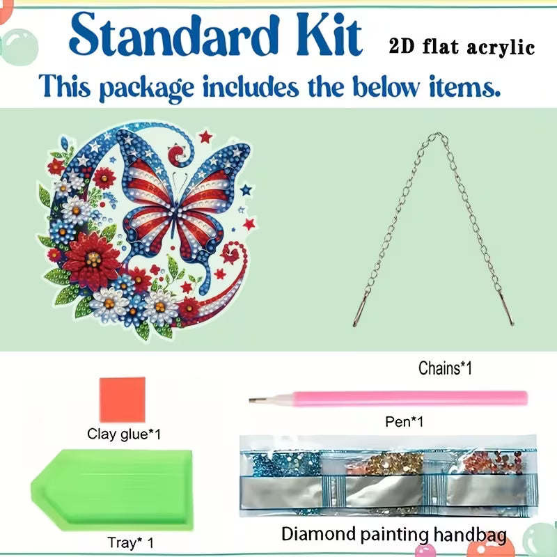 Standard kit for diamond painting with butterfly design, chains, pen, clay glue, tray on a light green background.