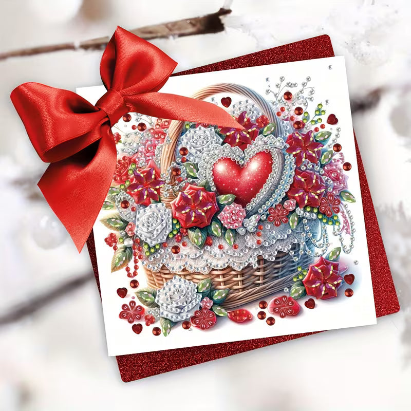 Decorative card with a red bow, heart, and floral design on a white background