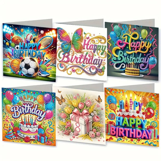 A set of six finished diamond art birthday cards, each with a unique design, including a butterfly, birthday cakes, balloons, flowers, and a sports theme