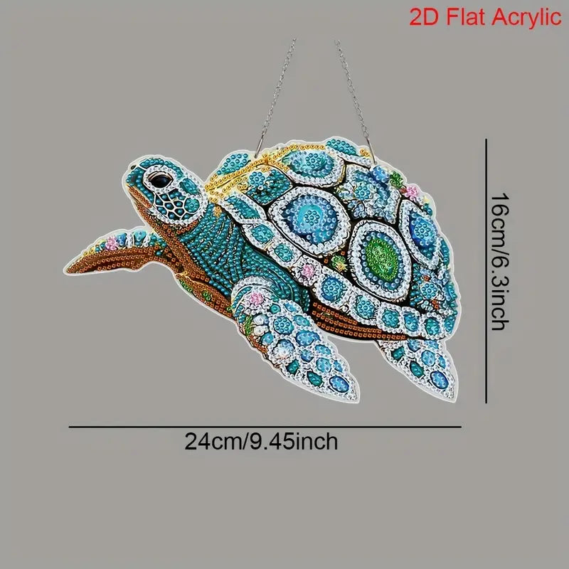 Colorful turtle-shaped acrylic decoration with measurements on a gray background