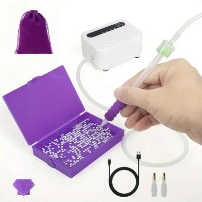 A Vacuum Diamond Painting Pen Set, including a USB-powered vacuum pump, a diamond painting pen with a hose, a tray, and a storage bag