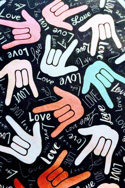  diamond painting canvas design featuring a repeating pattern of the American Sign Language hand sign for 'I love you' in various pastel colors on a black background with the word 'love' in script